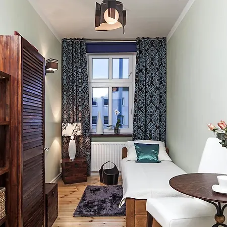 Δωμάτια σε οικογενειακή κατοικία Grunwaldzkie - Parking W Cenie